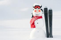 Schneemann mit Ski